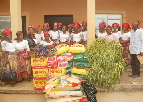 COMMUNITY WOMEN REPRESENTATIVES WITH DONATED ITEMS